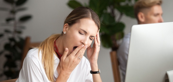 A woman feeling very sleepy